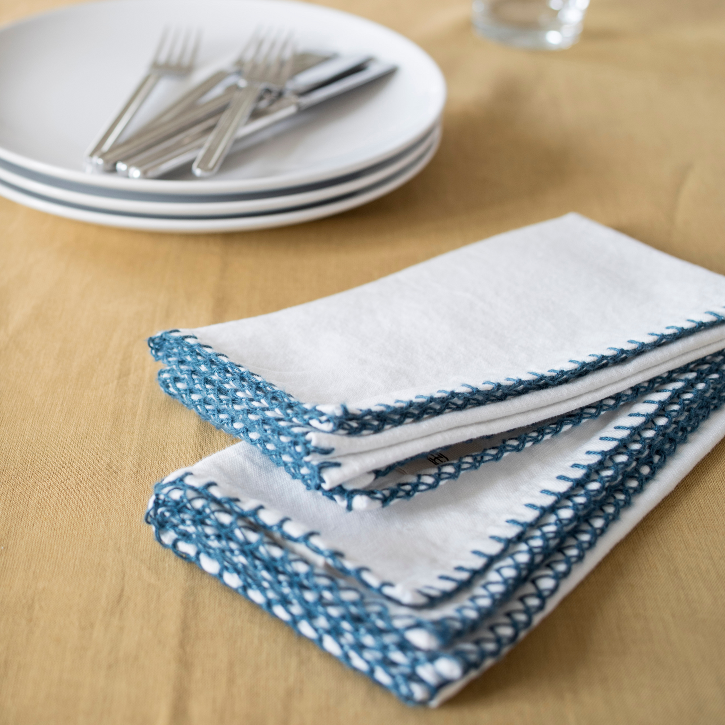 Solid Napkin with Blue Hem Stitch